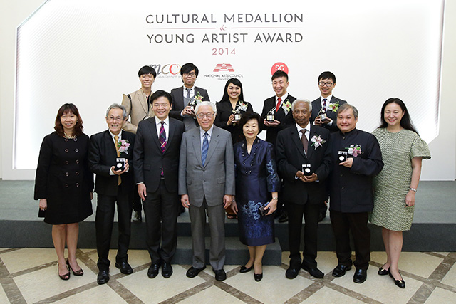 14 (L-R) NAC CEO Ms Kathy Lai, Minister, President, First Lady and MCCY Permanent Secretary Ms Yeoh Chee Yan with the eight CM and YAA recipients