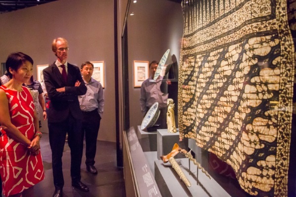 In this picture, British Museum Curator Brendan Moore highlights one of the earliest recorded batik cloths that is part of the British Museum’s Sir Stamford Raffles collection.
