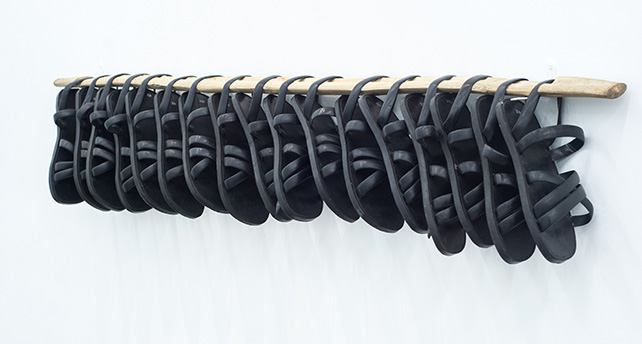 SVAY Sareth, Stake or Skewer, 2015, Wood, 17 rubber sandals, 149 x 25 cm